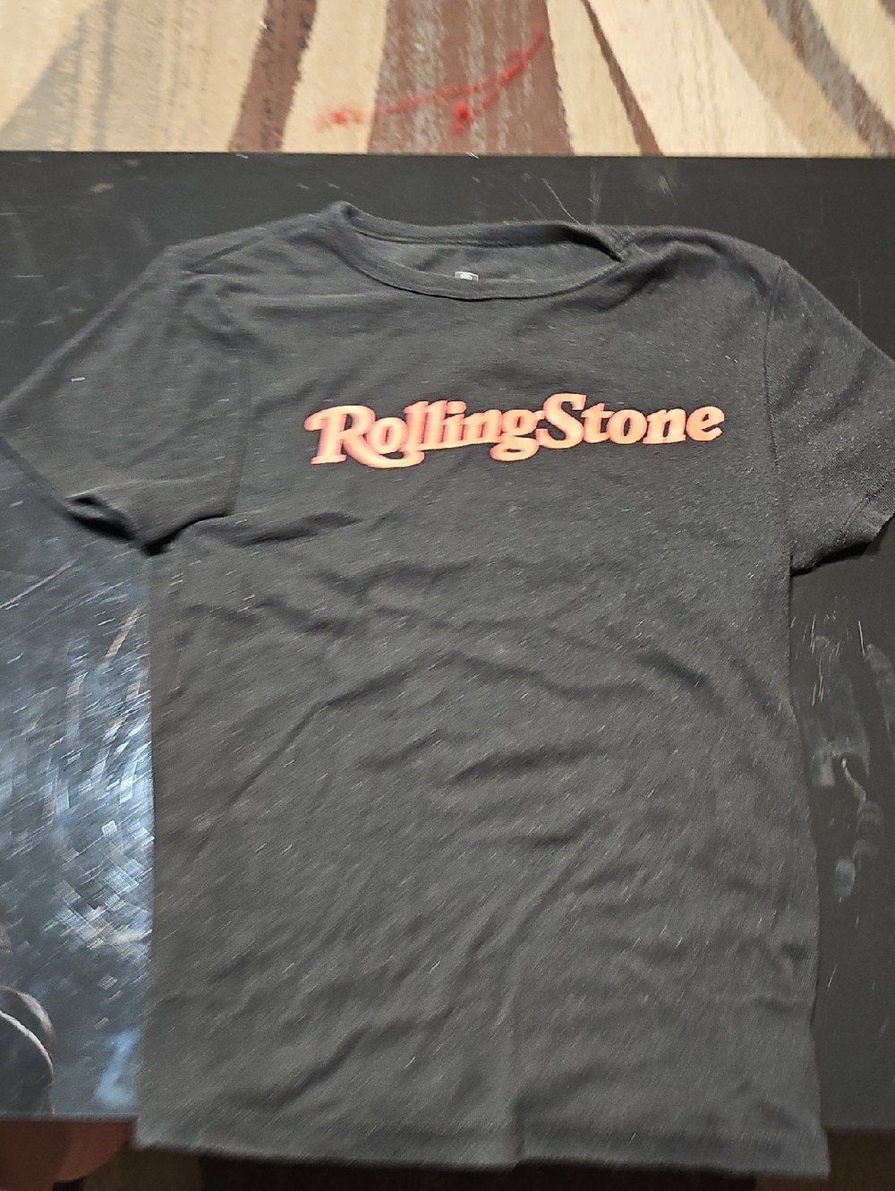 the Rolling Stones Black Tee with Red Logo